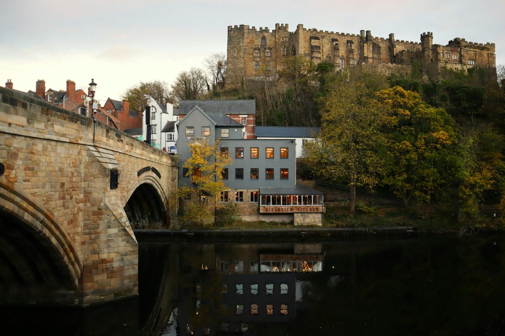 Shows an example of what one might see on a day trip from Newcastle to Durham to see the medieval Framwellgate Bridge 